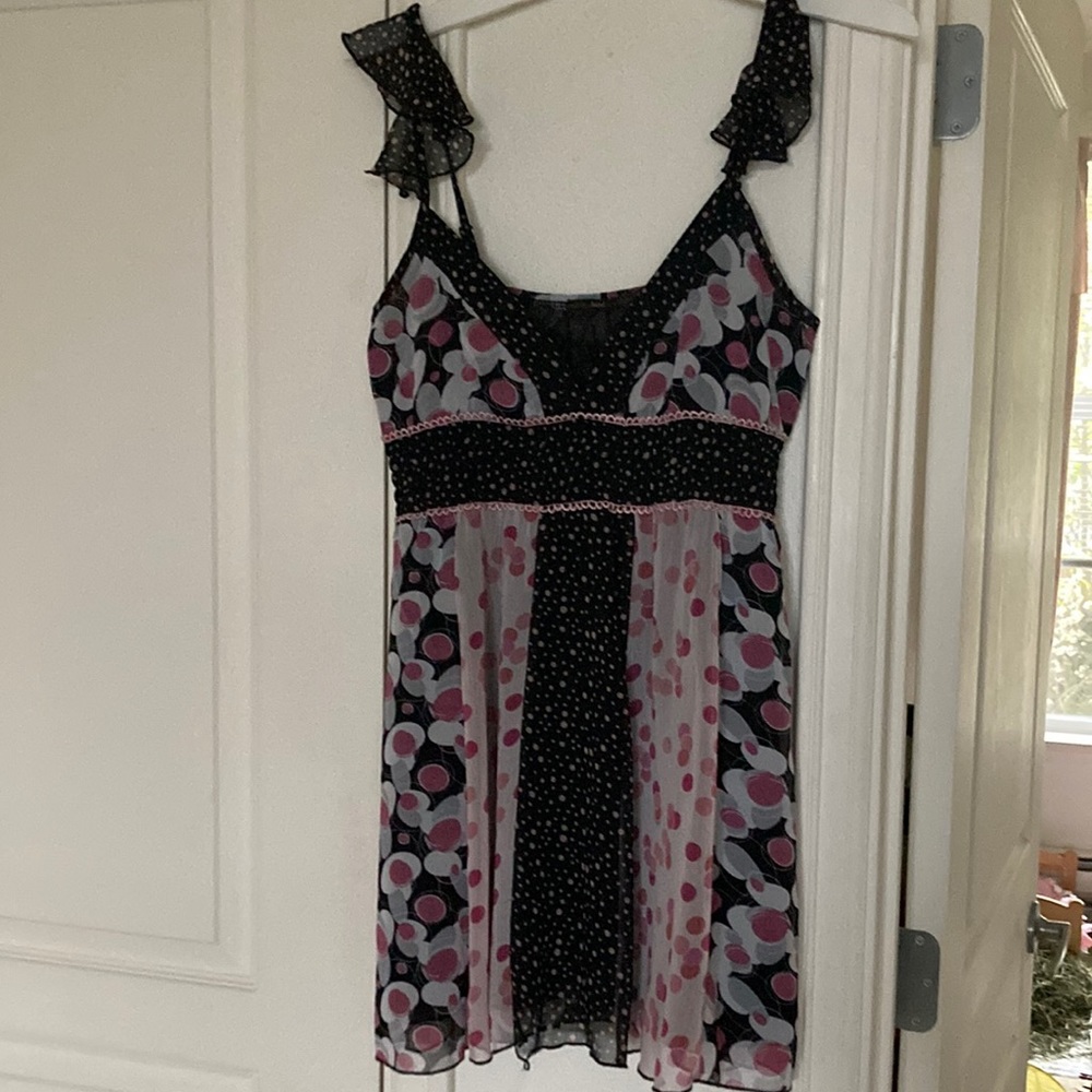 Like new barely worn sheer, flowy baby doll blouse. Gorgeous
